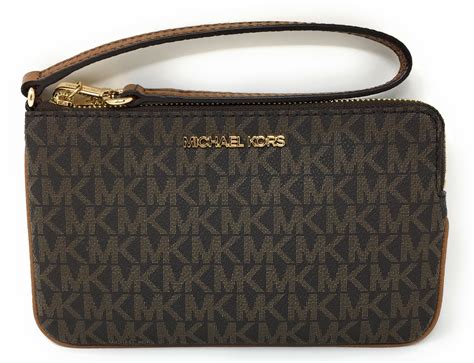 womens clutch purse michael kors|michael kors large wristlet clutch.